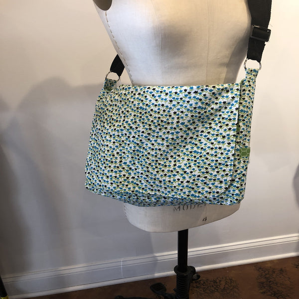 Cross-body Messenger Bag, fully reversible with a total of 12 pockets and adjustable strap.  Pop-culture, Star Wars, Star Trek, Walking Dead, Wonder Woman, Vintage Steampunk and flowered patterns.