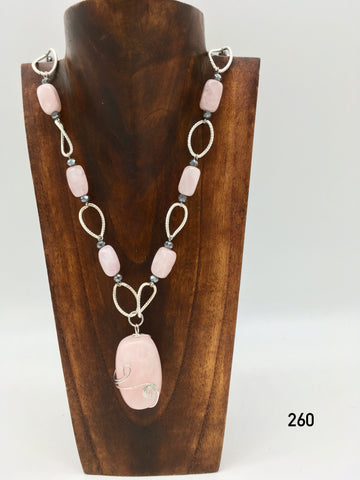 Rose quartz, glass crystal with silver plated chain