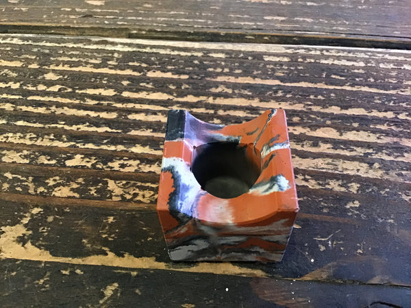 Concrete cigar rest
