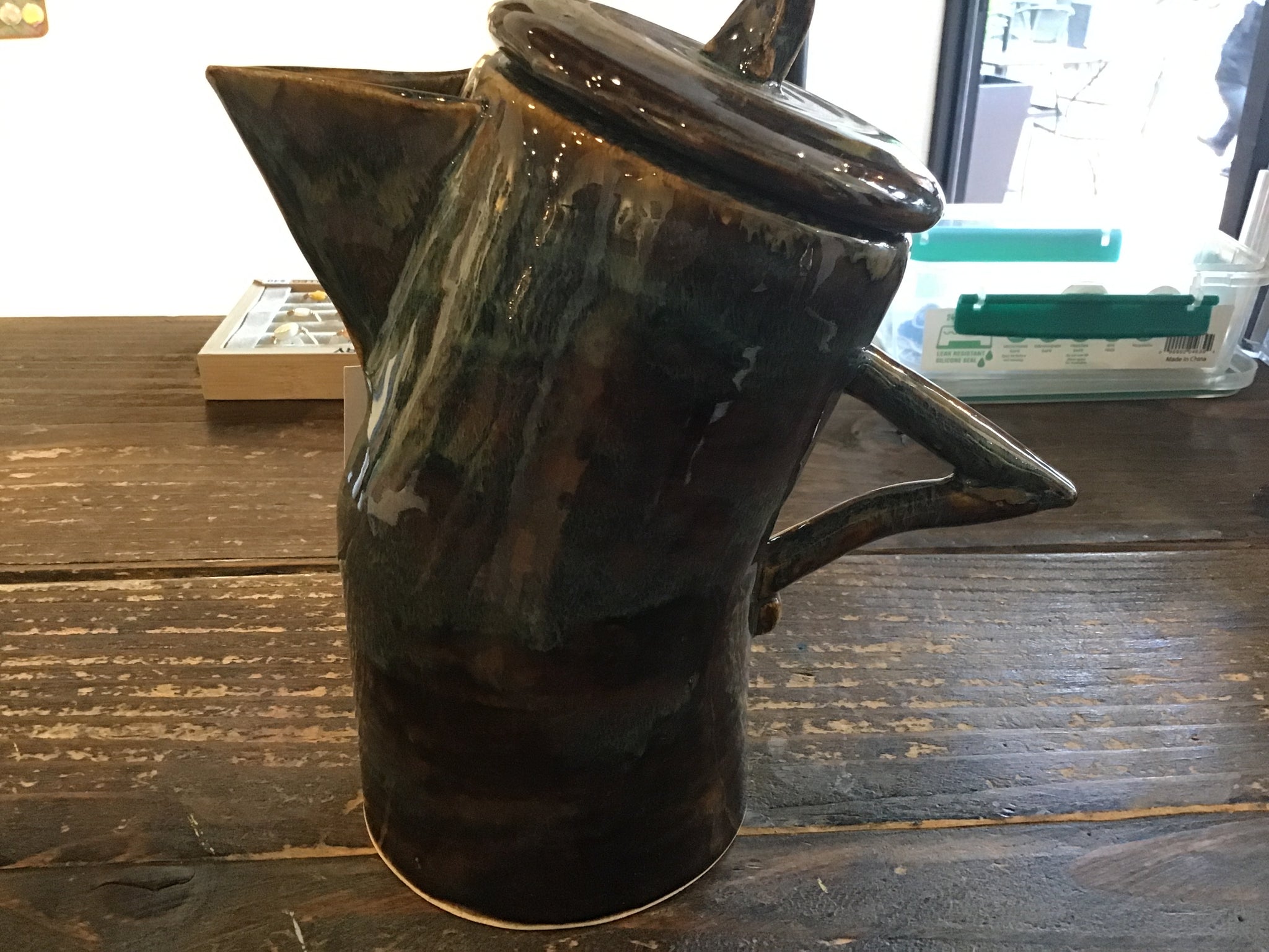 Tilted Tea Pot