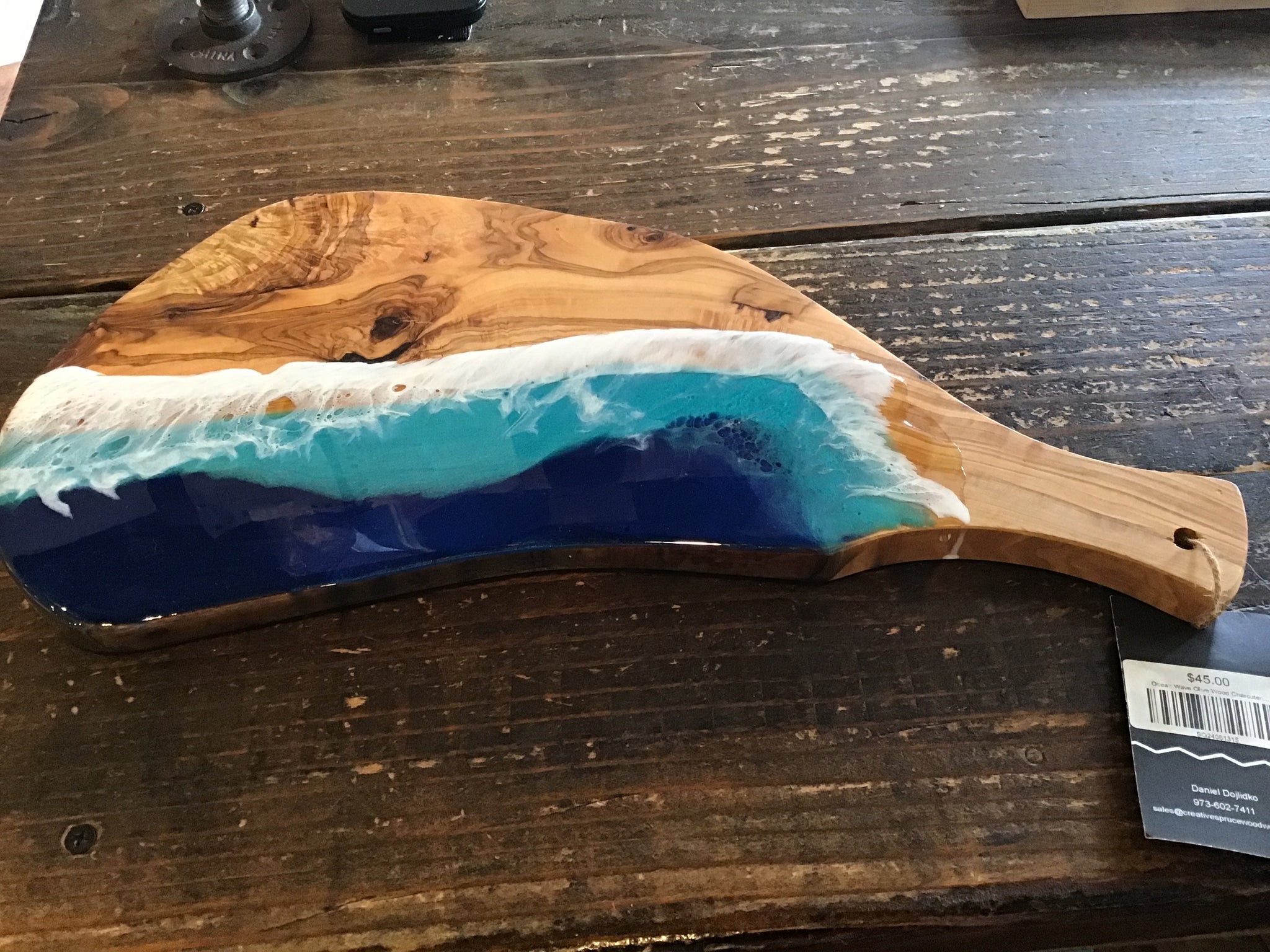 Ocean wave charcuterie board with handle
