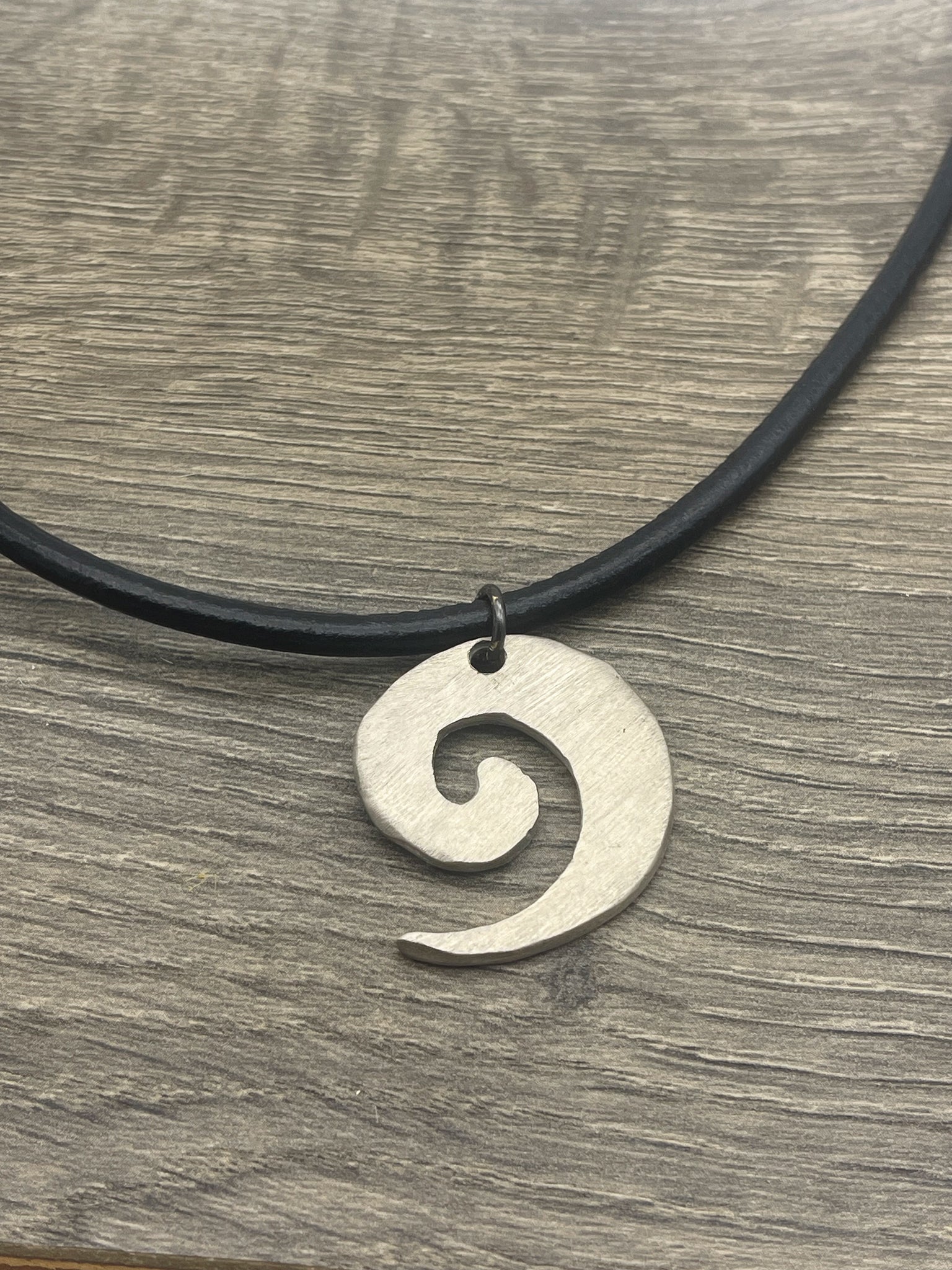 White Copper Swirl Necklace on Leather Cord