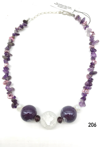 Amethyst chips, purple freshwater pearls, large ceramic and glass beads created by Dorothea Drew Designs of NJ