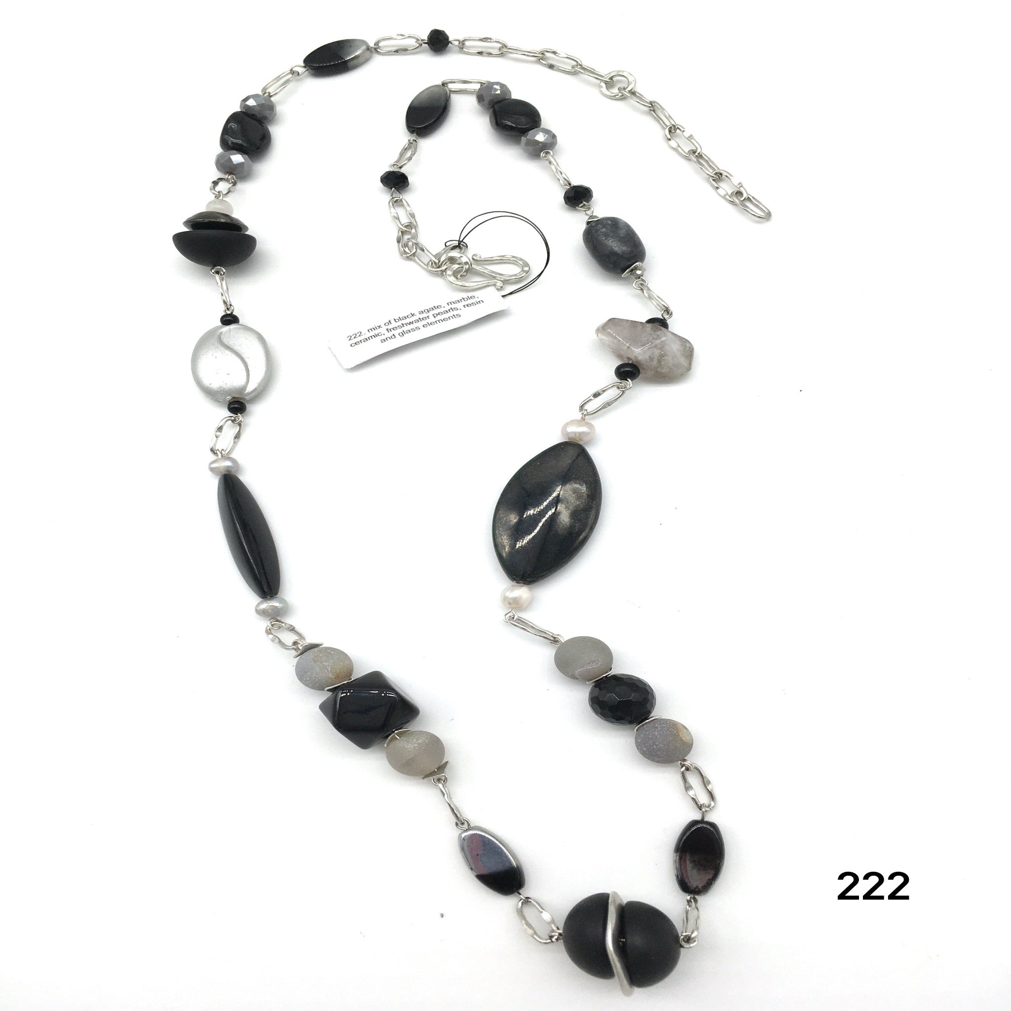 Mix of black agate, marble, ceramic, freshwater pearls, resin and glass elements necklace created by Dorothea Drew Design from central NJ