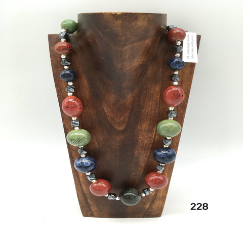 Ceramic beads, hematite cubes, silver plated spacers necklace created by Dorothea Drew Design central NJ