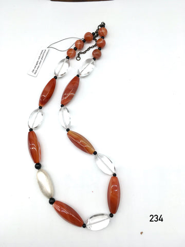 Red agate, rock crystal, black onyx, silver plated focal