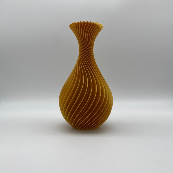 3D printed gold twisted vase created by NJ artist