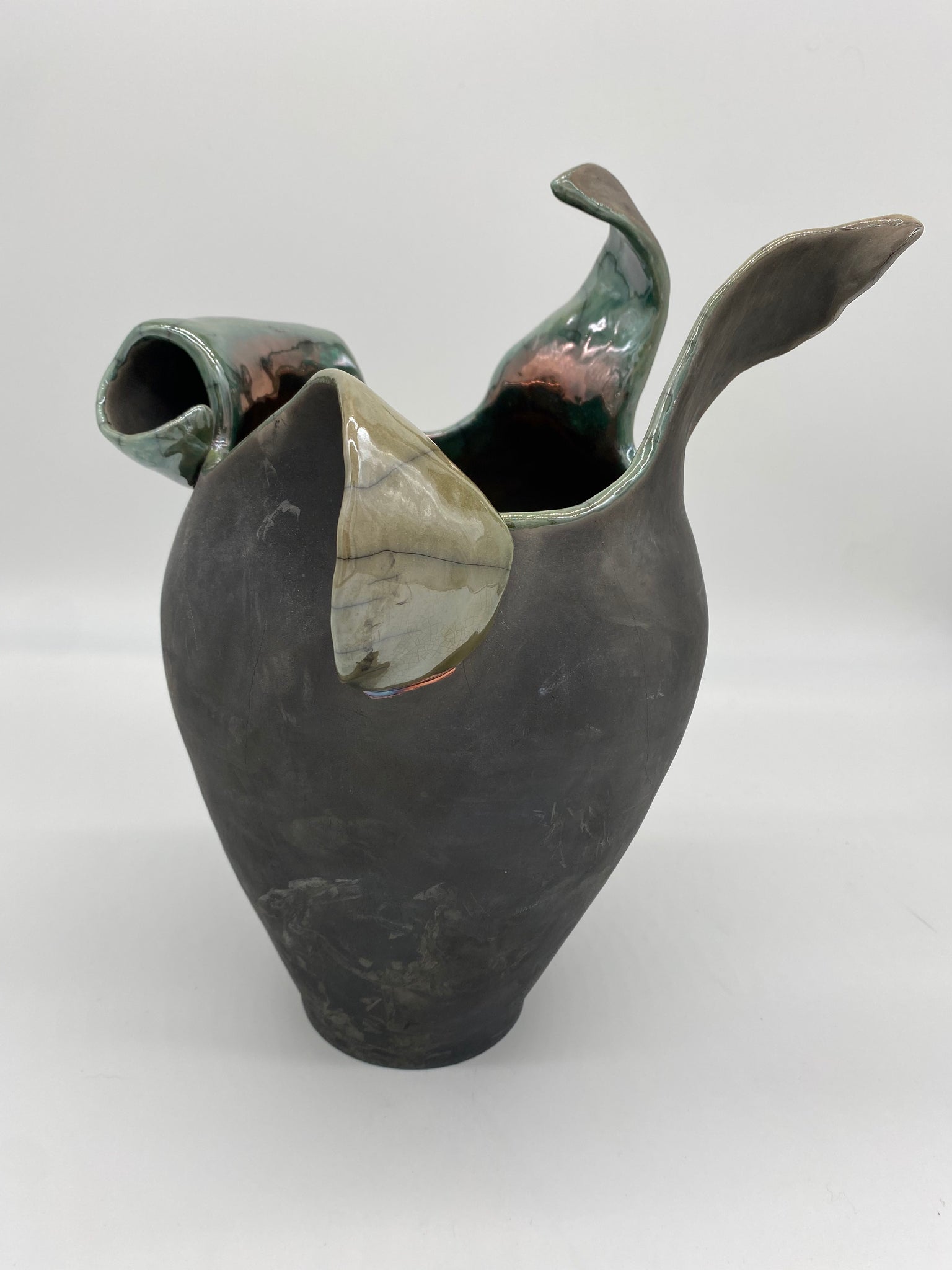 Raku fired thrown and altered white stoneware ceramic artist Jane Kleiman of NJ