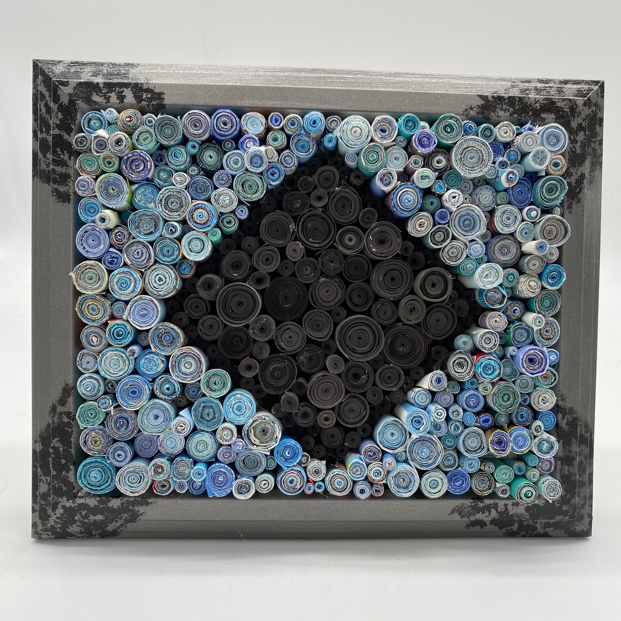 Blue diamond rolled magazines created by Trash Art Treasures