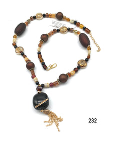 Mixed glass beads; pendant venetian glass bead, gold-plated hematite, ceramic bead with Swarovski crystal