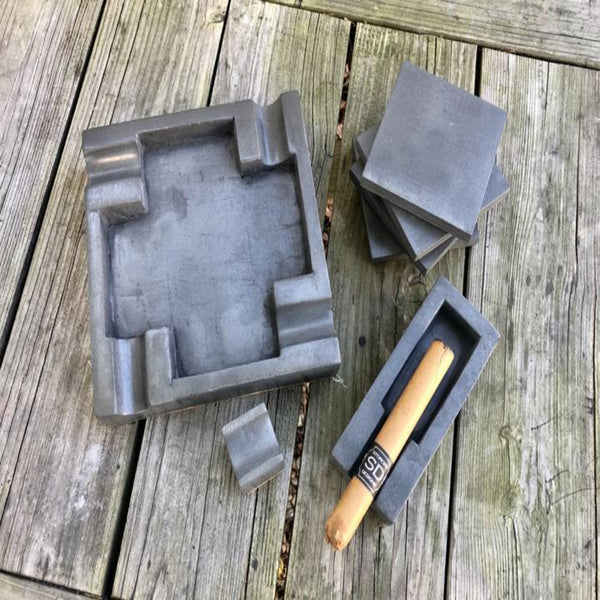 Dark gray concrete ashtrays & coasters by Storck Designs of NJ