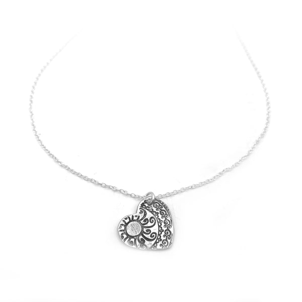 Small Sterling Silver Heart Necklace with Swirl and Sun Design