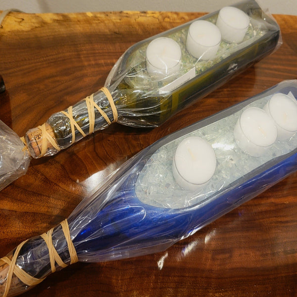 Long bottle candles with votives from Vintage Crossroad