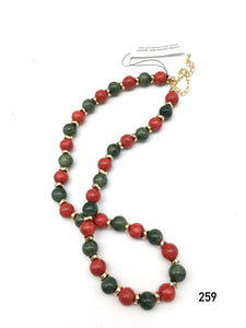 Red bamboo coral, green quartzite, gold hematite spacers